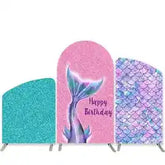 Mermaid-themed birthday banner with glittery texture and vibrant colors, featuring a blue tail design on teal background.